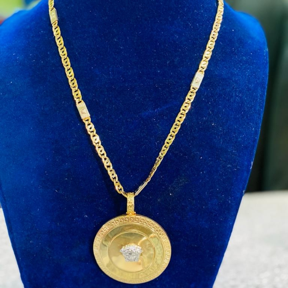 18krat real Gold in Versace design